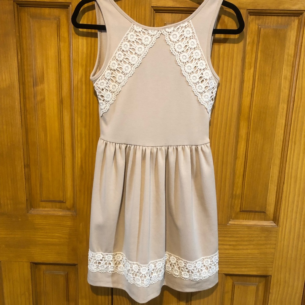 Cream cocktail dress with white lace trim